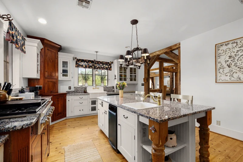 Main House kitchen — full chef layout with bar seating